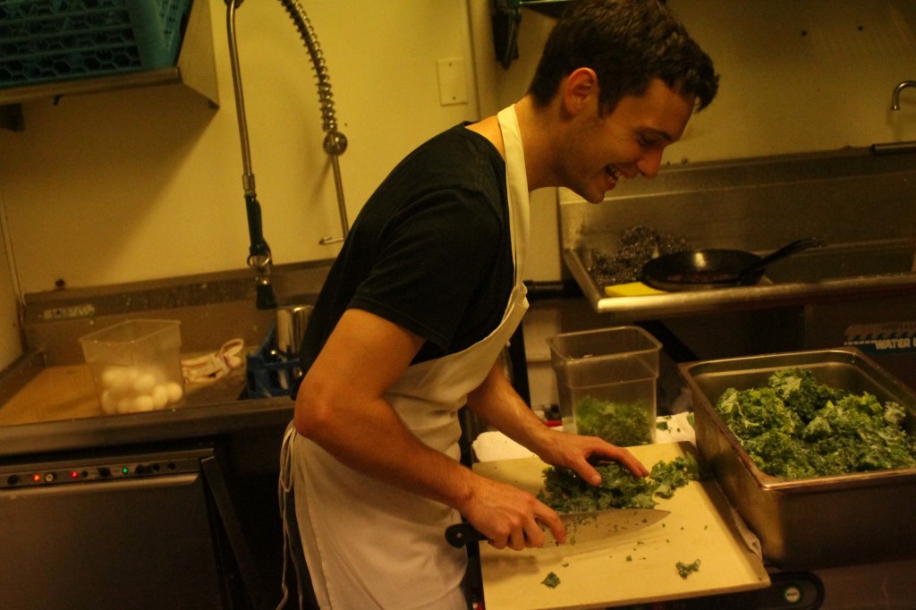 Sean McNamara preps food in the back room at The Mill before sending it to the kitchen during service (Photo: Sam MacKay)