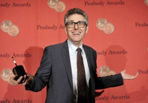 Radio producer Ira Glass poses with his award at the 72nd Annual George Foster Peabody Awards at the Waldorf-Astoria on Monday, May 20, 2013 in New York. (AP Photo/Evan Agostini)