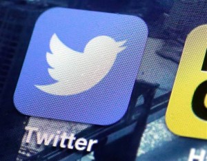 Social media, such as Twitter, as a news source isn't always reliable, but journalists can use it to update stories frequently, captivating an audience's attention. (AP Photo by Richard Drew)